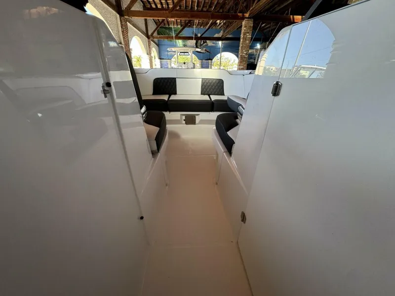 Slide: The Image of 2024 Monterey M-65 boat interior with sleek seating and modern design. - 18