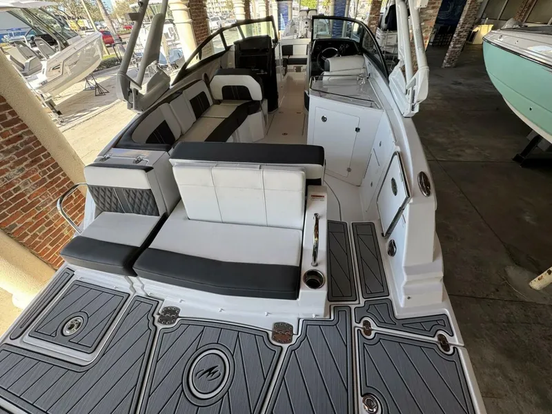 Slide: The Image of 2024 Monterey M-65 boat interior with sleek seating and modern design. - 2