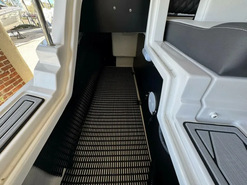 Slide: The Image of 2024 Monterey M-65 boat interior with sleek seating and modern design elements. - 6