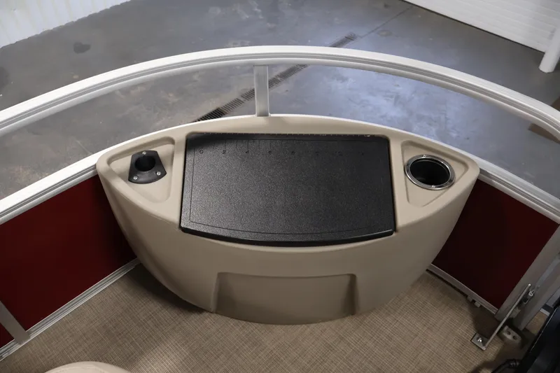 Slide: The Image of 2021 Sun Tracker Bass Buggy 18 DLX boat console with cup holder and storage. - 14