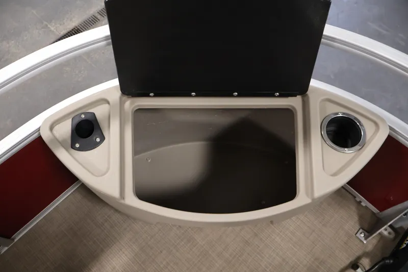 Slide: The Image of 2021 Sun Tracker Bass Buggy 18 DLX storage compartment with cup holders. - 15