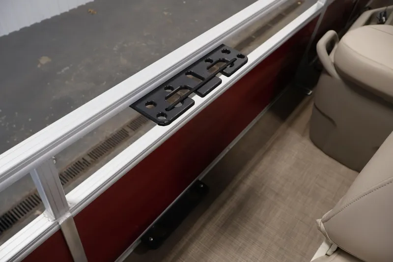 Slide: The Image of 2021 Sun Tracker Bass Buggy 18 DLX interior with seating and railing detail. - 20