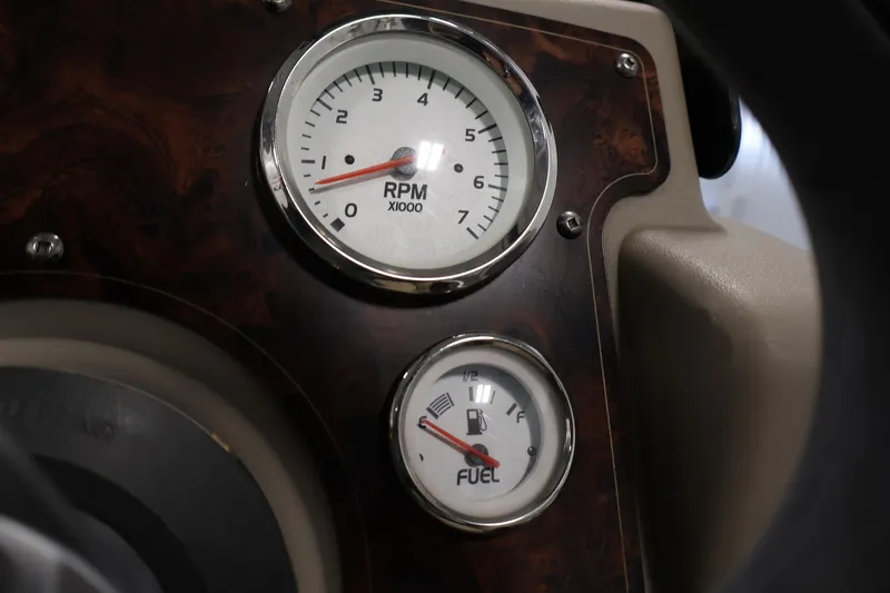 Slide: The Image of Dashboard of 2021 Sun Tracker Bass Buggy 18 DLX with RPM and fuel gauges. - 29