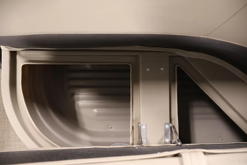 Slide: The Image of 2021 Sun Tracker Bass Buggy 18 DLX interior storage compartment detail. - 35