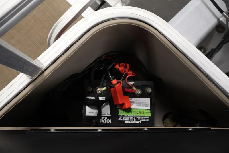 Slide: The Image of Battery compartment of 2021 Sun Tracker Bass Buggy 18 DLX pontoon boat. - 39