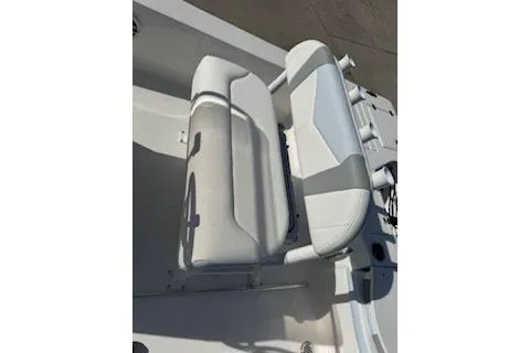 Slide: The Image of 2026 Robalo 206 Cayman boat seat, white and gray upholstery, close-up view. - 17