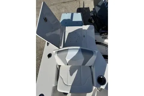 Slide: The Image of 2026 Robalo 206 Cayman boat interior with open storage compartment and seating. - 30