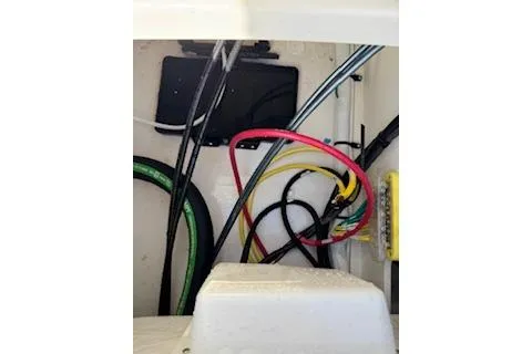 Slide: The Image of Wiring and components inside a 2026 Robalo 206 Cayman boat. - 32