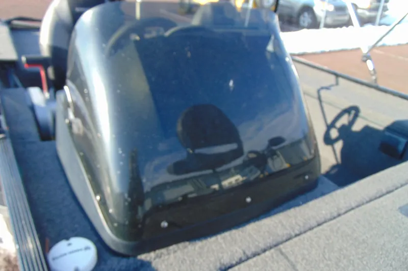 Slide: The Image of 2020 Crestliner 1600 Storm boat interior with steering wheel and dashboard. - 11