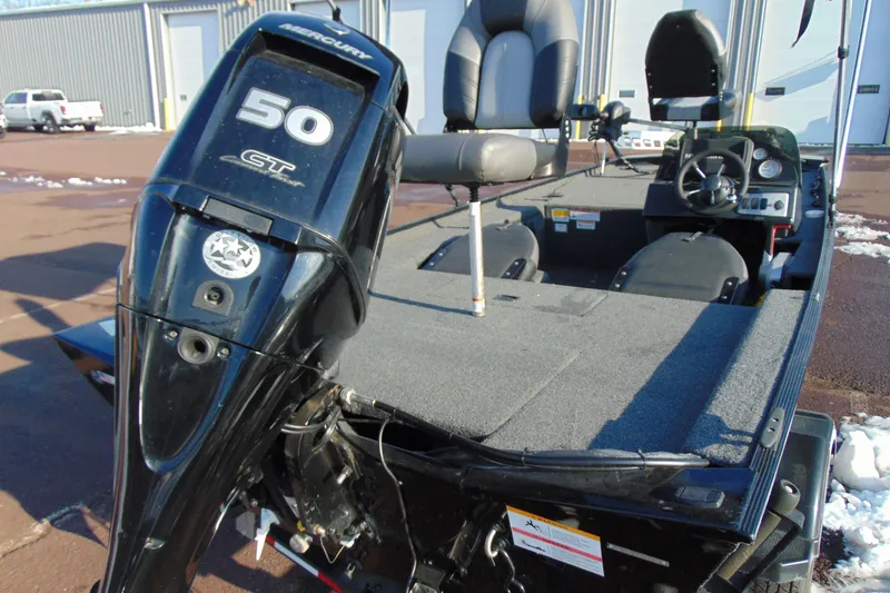 Slide: The Image of 2020 Crestliner 1600 Storm boat with Mercury 50 HP engine, parked outdoors. - 3