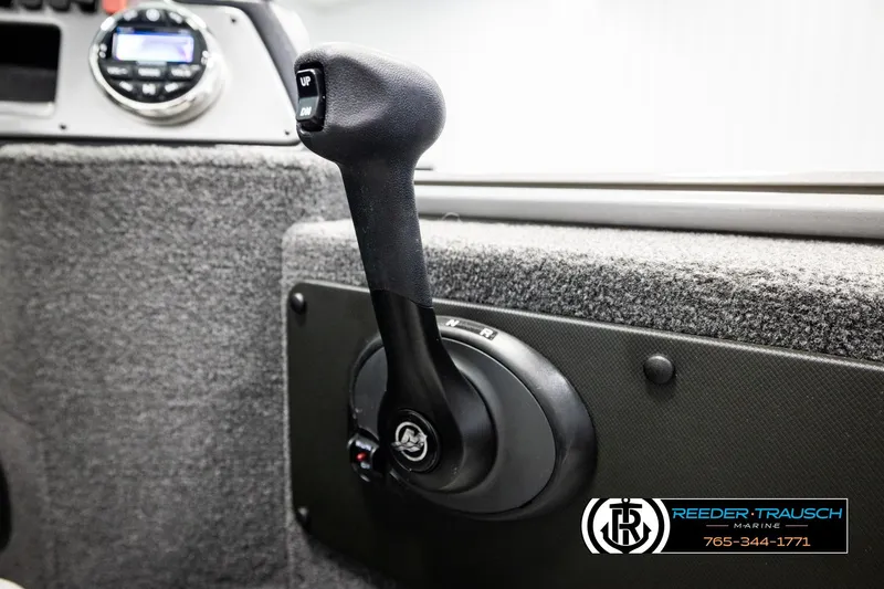 Slide: The Image of 2023 Lund 1875 Impact XS boat throttle control, featuring ergonomic design and precise handling. - 39