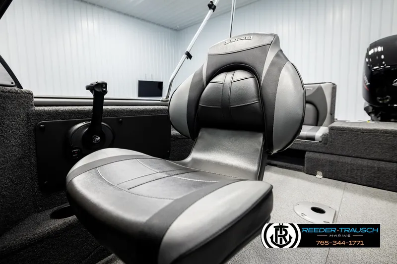 Slide: The Image of 2023 Lund 1875 Impact XS boat interior with comfortable seating and modern design. - 40