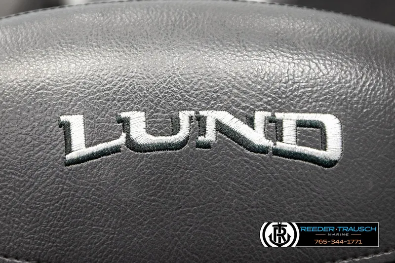 Slide: The Image of Close-up of Lund logo on 2023 Lund 1875 Impact XS boat seat. - 42