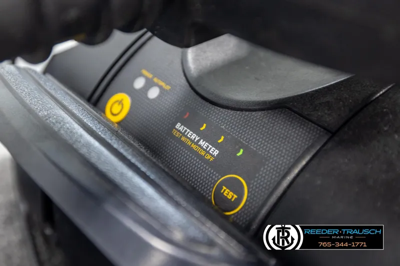 Slide: The Image of Close-up of 2023 Lund 1875 Impact XS battery meter and controls. - 46