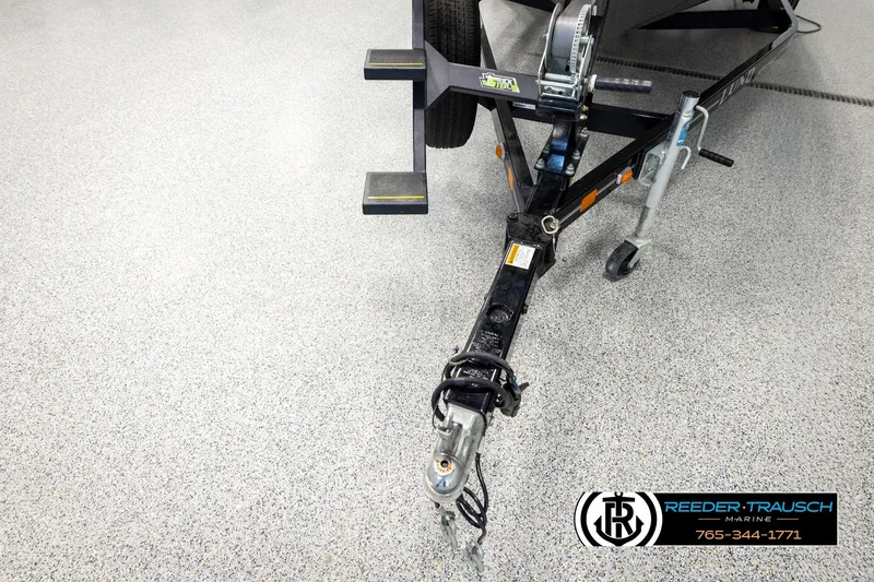 Slide: The Image of Trailer hitch of 2023 Lund 1875 Impact XS boat on showroom floor. - 54