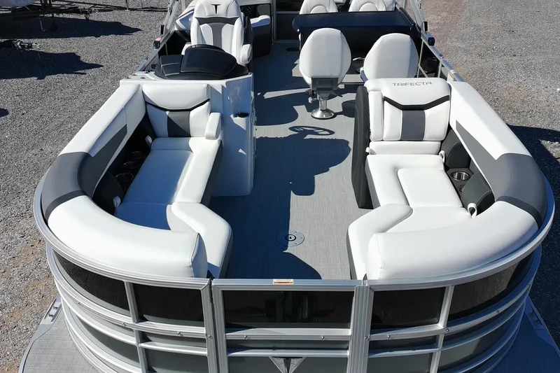 Slide: The Image of 2026 Trifecta 24E CS pontoon boat with luxurious seating and modern design. - 11
