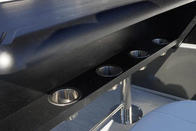 Slide: The Image of Cup holders on a 2026 Trifecta 24E CS boat, featuring sleek design and modern finishes. - 22