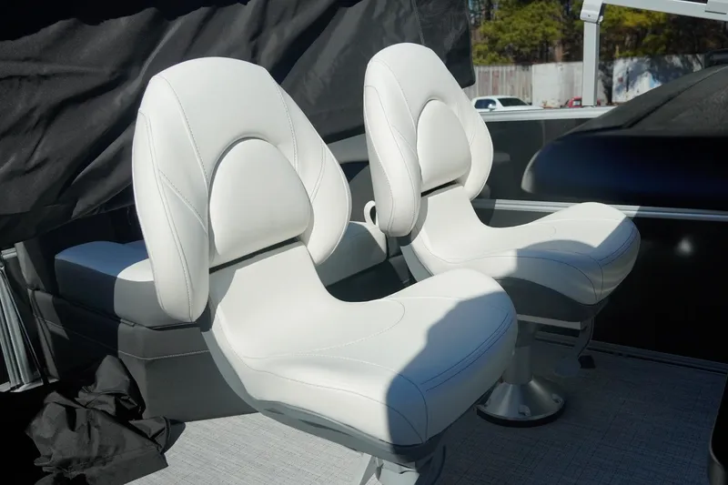 Slide: The Image of Luxury white seats on 2026 Trifecta 24E CS boat, showcasing modern design. - 23
