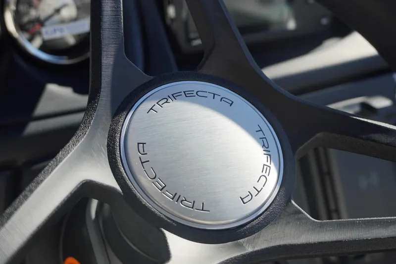 Slide: The Image of Close-up of 2026 Trifecta 24E CS steering wheel emblem. - 27