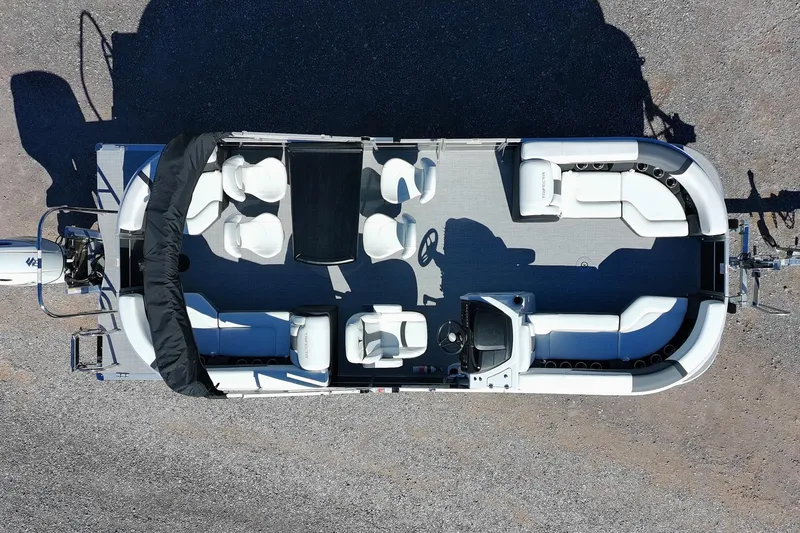 Slide: The Image of Aerial view of 2026 Trifecta 24E CS pontoon boat with spacious seating layout. - 3