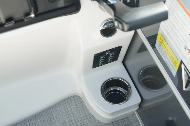 Slide: The Image of Control panel and cup holder on 2026 Trifecta 24E CS boat. - 33