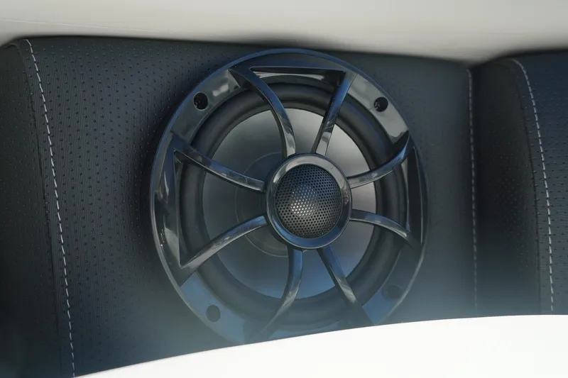 Slide: The Image of Close-up of a speaker in a 2026 Trifecta 24E CS boat interior. - 35