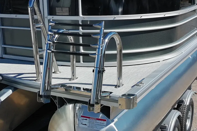 Slide: The Image of Stainless steel ladder on 2026 Trifecta 24E CS pontoon boat deck. - 47