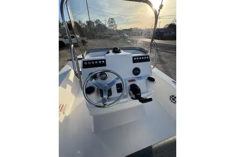 Slide: The Image of 2026 Rabalo 206 Cayman boat console with steering wheel and controls. - 16