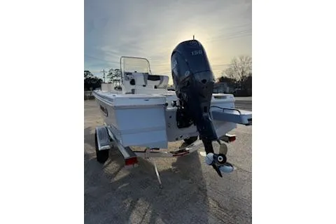 Slide: The Image of 2026 Rabalo 206 Cayman boat with outboard motor, parked on a trailer. - 3