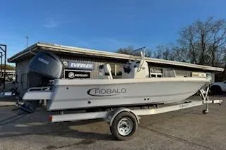 Slide: The Image of 2026 Rabalo 206 Cayman boat on trailer, parked outdoors near a building. - 5