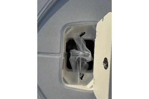 Slide: The Image of 2026 Rabalo 206 Cayman boat storage compartment with open hatch. - 9