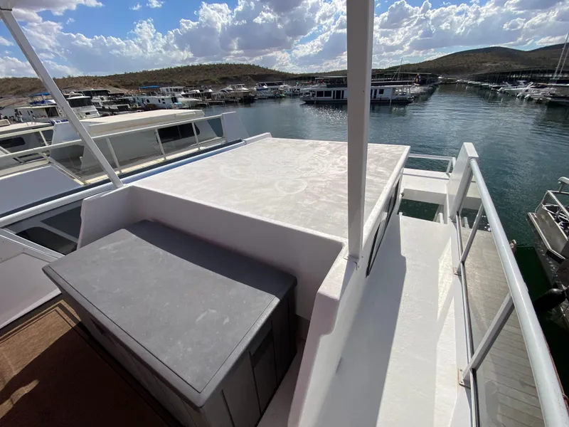 Slide: The Image of 1988 Three Buoys 4412 boat deck with scenic marina view. - 32