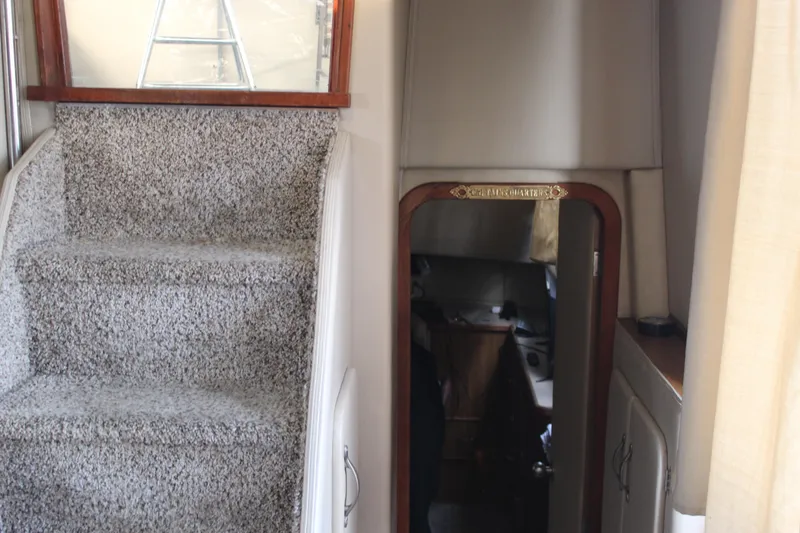 Slide: The Image of Interior view of 1987 Chris-Craft 381 Catalina with carpeted stairs and cabin entrance. - 20