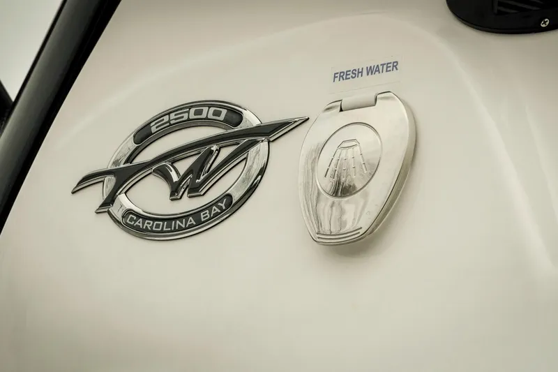 Slide: The Image of 2026 Tidewater 2500 Carolina Bay emblem and fresh water access. - 14