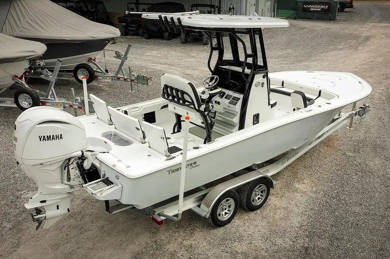 Slide: The Image of 2026 Tidewater 2500 Carolina Bay boat with Yamaha engine on trailer. - 4
