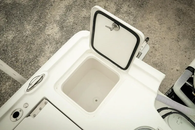 Slide: The Image of Open storage compartment on 2026 Tidewater 2500 Carolina Bay boat. - 44
