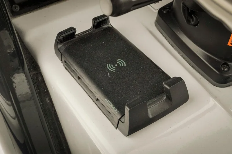 Slide: The Image of Wireless charging pad on 2026 Tidewater 2500 Carolina Bay boat console. - 49