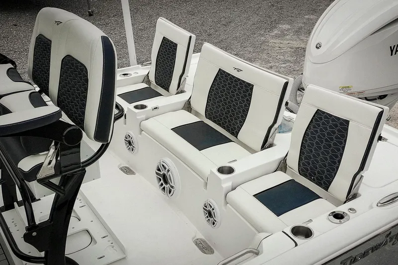 Slide: The Image of 2026 Tidewater 2500 Carolina Bay boat interior with stylish seating and modern design. - 56
