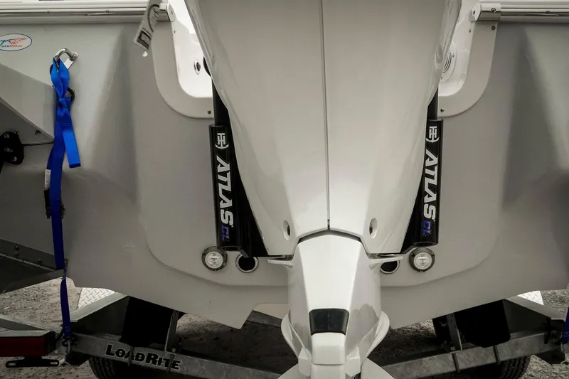 Slide: The Image of 2026 Tidewater 2500 Carolina Bay boat on trailer, featuring Atlas components. - 60