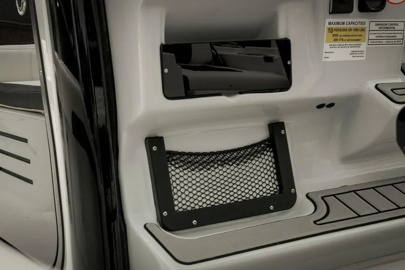 Slide: The Image of 2026 Tidewater 2500 Carolina Bay interior storage compartments and seating details. - 65