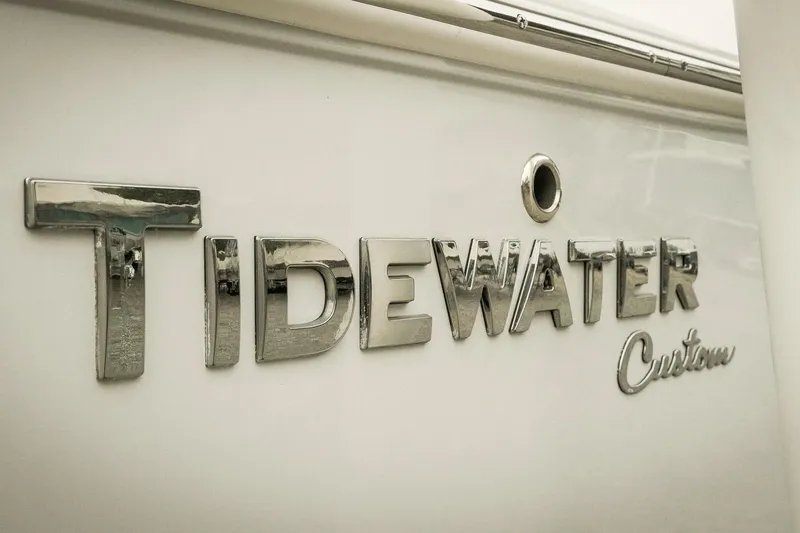 Slide: The Image of 2026 Tidewater 2500 Carolina Bay boat logo in chrome lettering. - 9