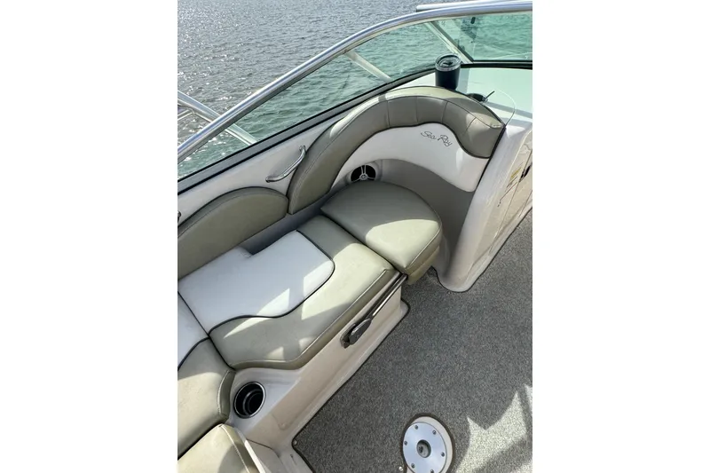 Slide: The Image of 2007 Sea Ray 200 Sundeck interior seating with water view. - 10