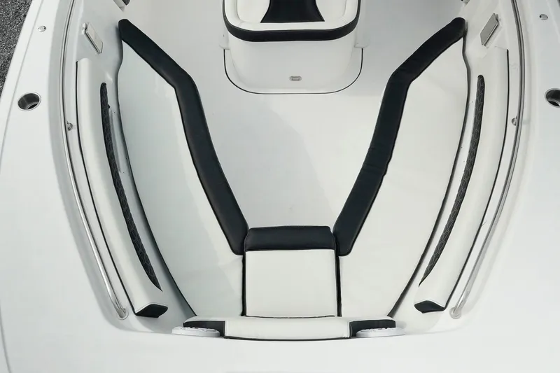 Slide: The Image of 2026 Tidewater 232 LXF boat interior with sleek white and black seating design. - 10