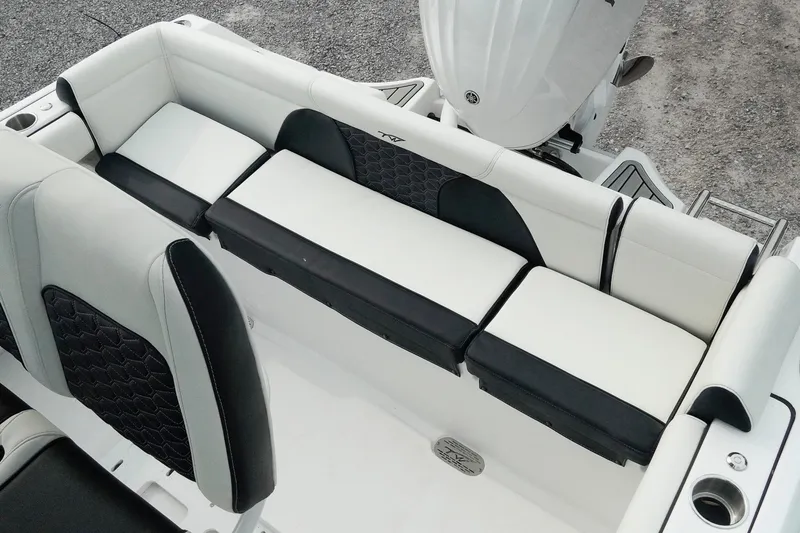 Slide: The Image of 2026 Tidewater 232 LXF boat seating with black and white upholstery, showcasing modern design. - 14