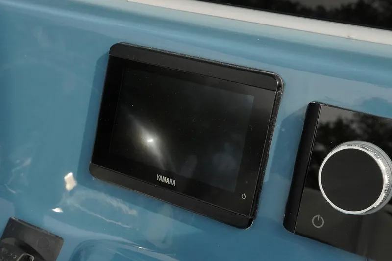 Slide: The Image of Yamaha display on 2026 Tidewater 232 LXF boat dashboard. - 24