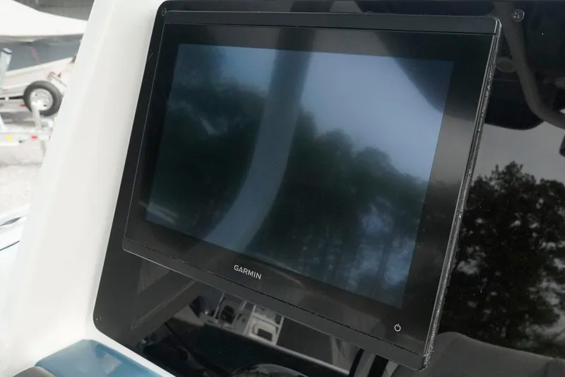Slide: The Image of Garmin display on 2026 Tidewater 232 LXF boat dashboard. - 29