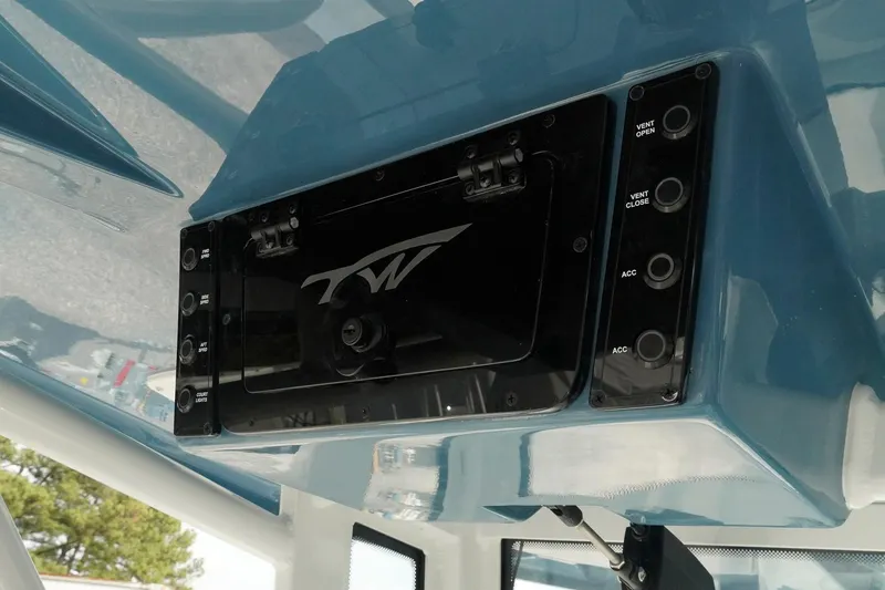 Slide: The Image of Control panel of 2026 Tidewater 232 LXF boat with buttons and logo. - 35