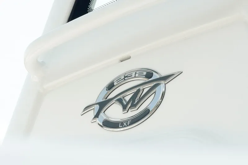 Slide: The Image of 2026 Tidewater 232 LXF boat emblem on white surface. - 41