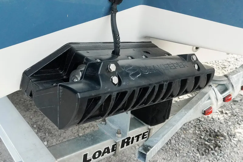 Slide: The Image of 2026 Tidewater 232 LXF boat with Seakeeper device on Load Rite trailer. - 42