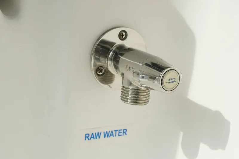 Slide: The Image of Chrome raw water outlet on 2026 Tidewater 232 LXF boat. - 46